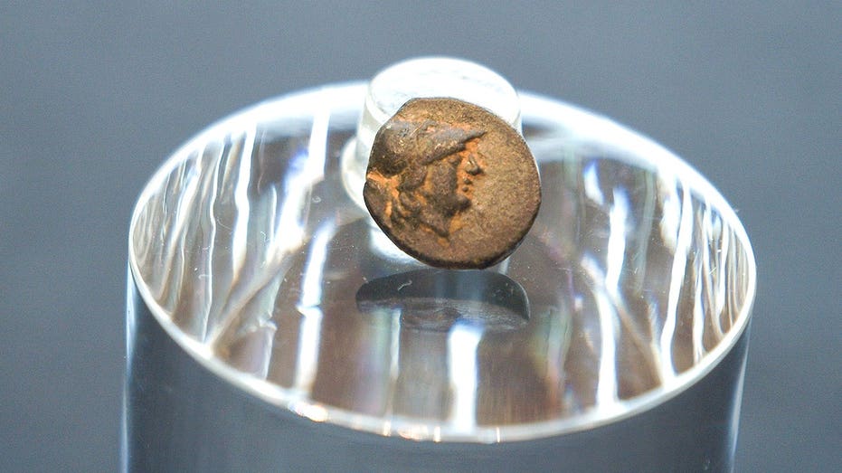 Teen stumbles on mysterious coin from legendary city, puzzling archaeologists over its journey Brisbane Private Schools